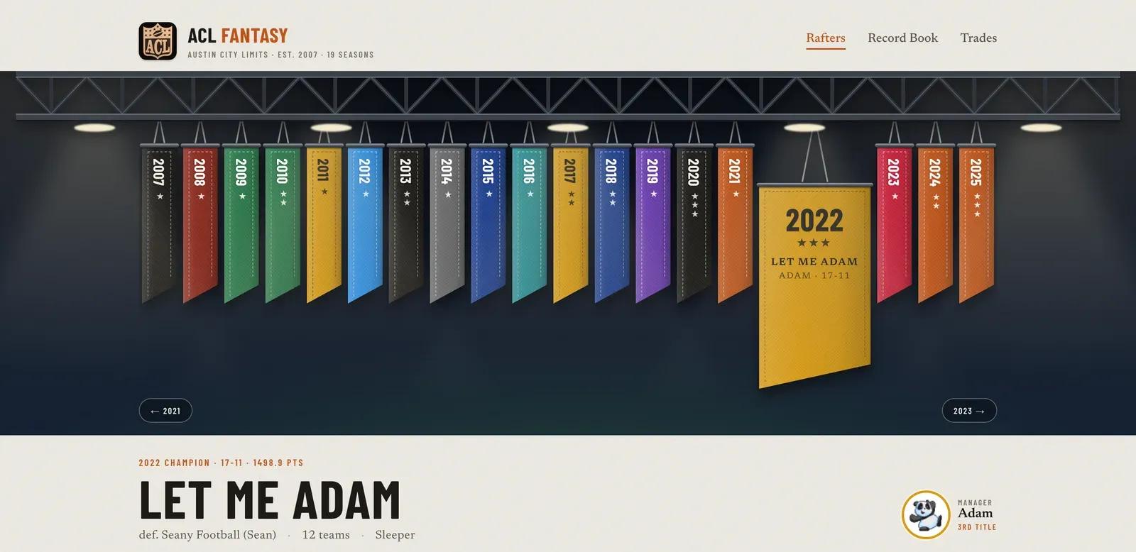 The site's first screen: a steel truss under spotlights with a banner hanging for every season from 2007 to 2025, the 2022 banner larger than the rest, and that year's champion, Let Me Adam, named below.